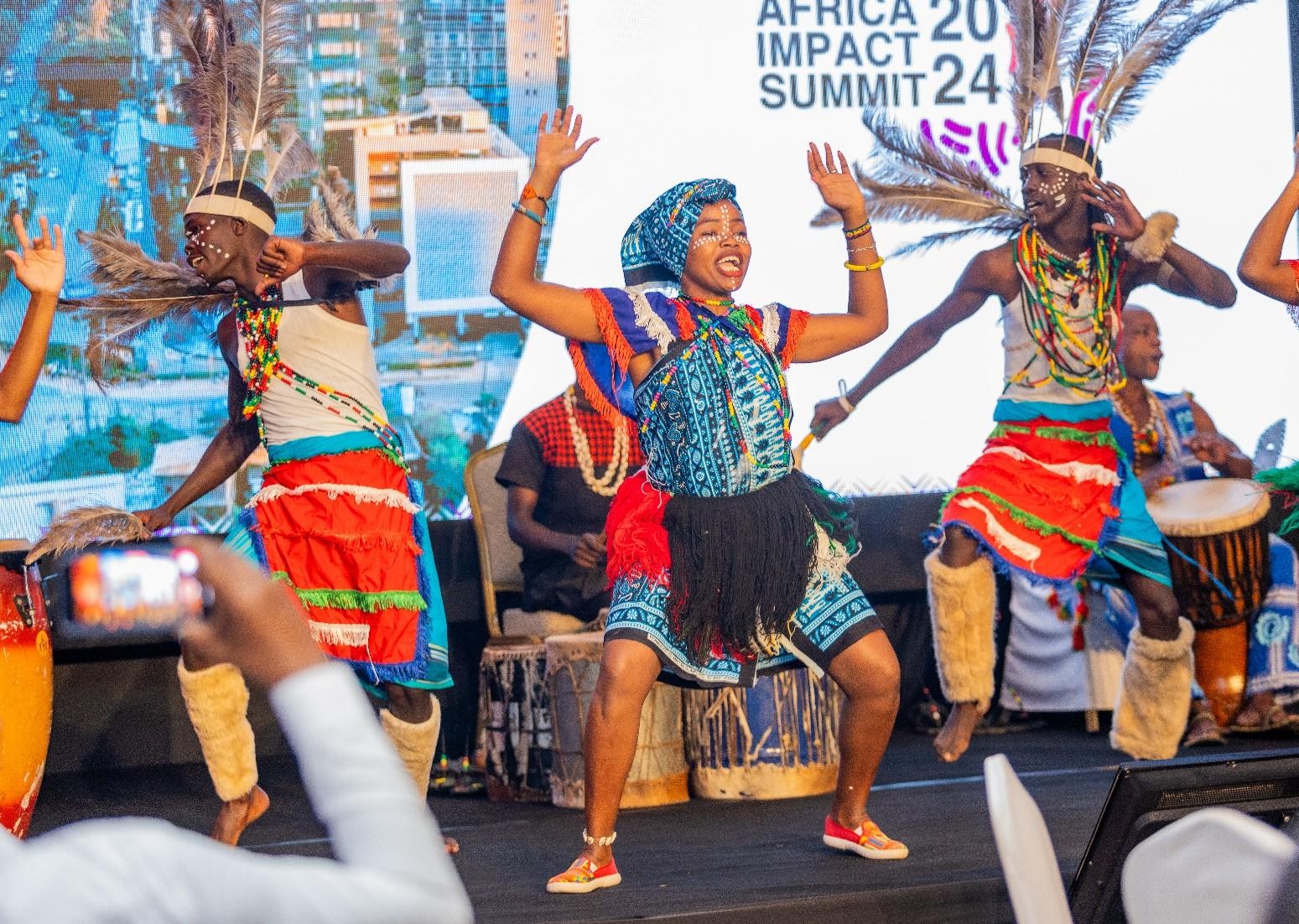Traditional dancers performing on stage at the Africa Impact Summit 2024