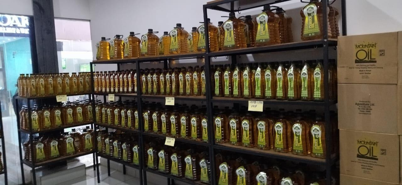 Cooking oil merchandised to standard on supermarket shelves